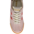 Pink trainer with red accents and white laces on a white background