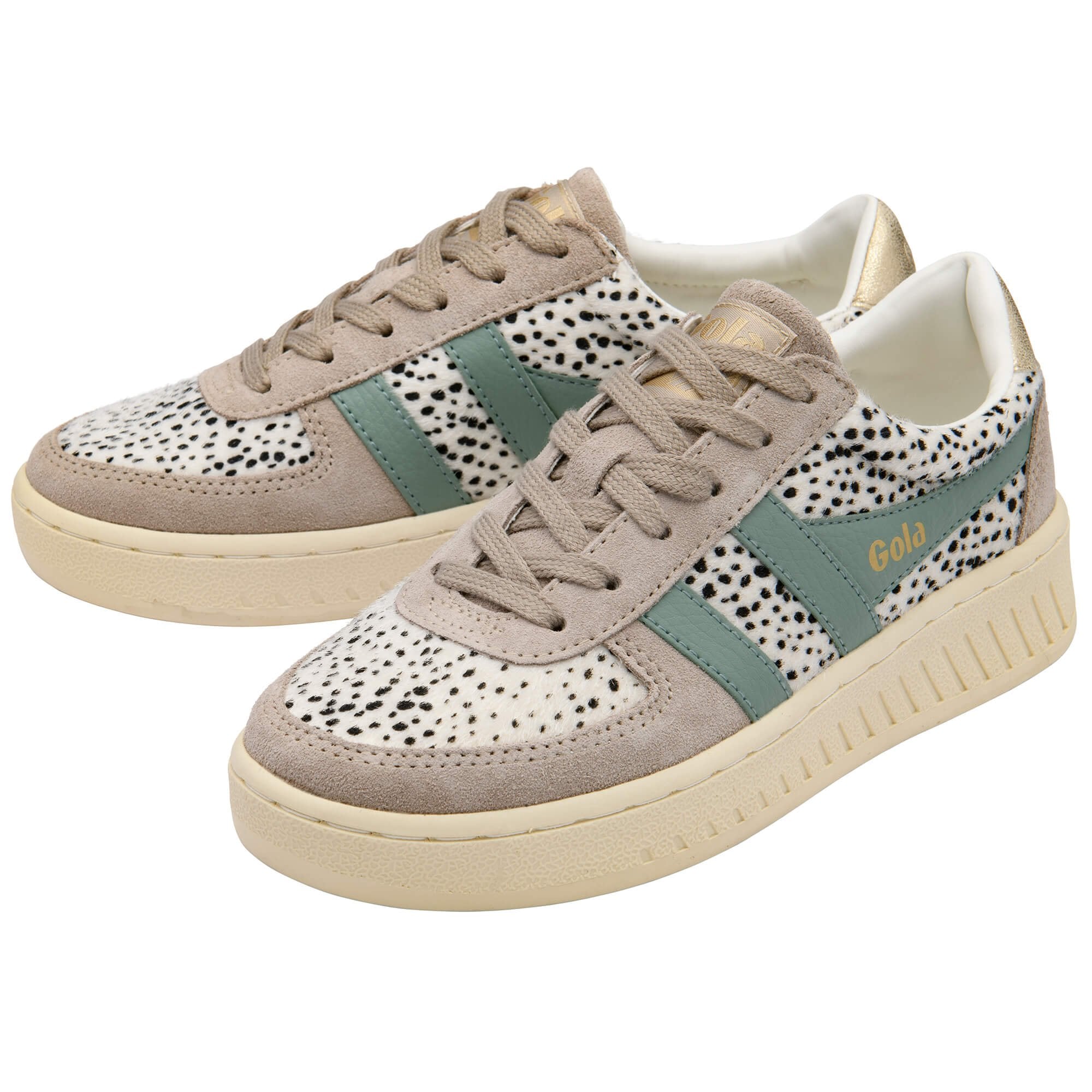 Pair of Gola trainers with animal print pattern and green stripes on a white background