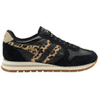 Black trainer with leopard print pattern on a white background