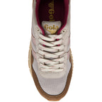 Gola trainer with brown sole and white laces on a white background