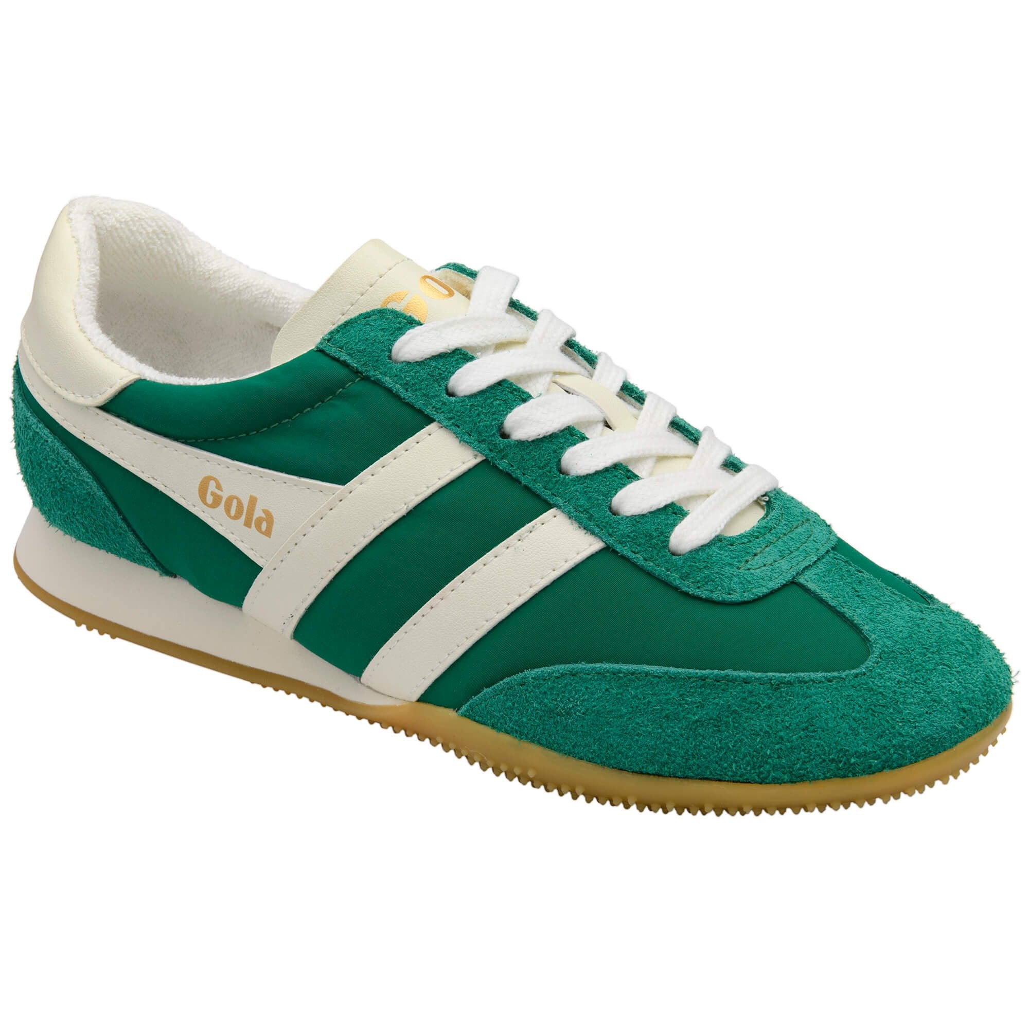 Green and white trainer with 'Gola' branding on a white background