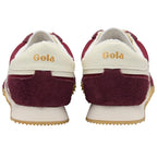 Maroon and white Gola trainers on a white background