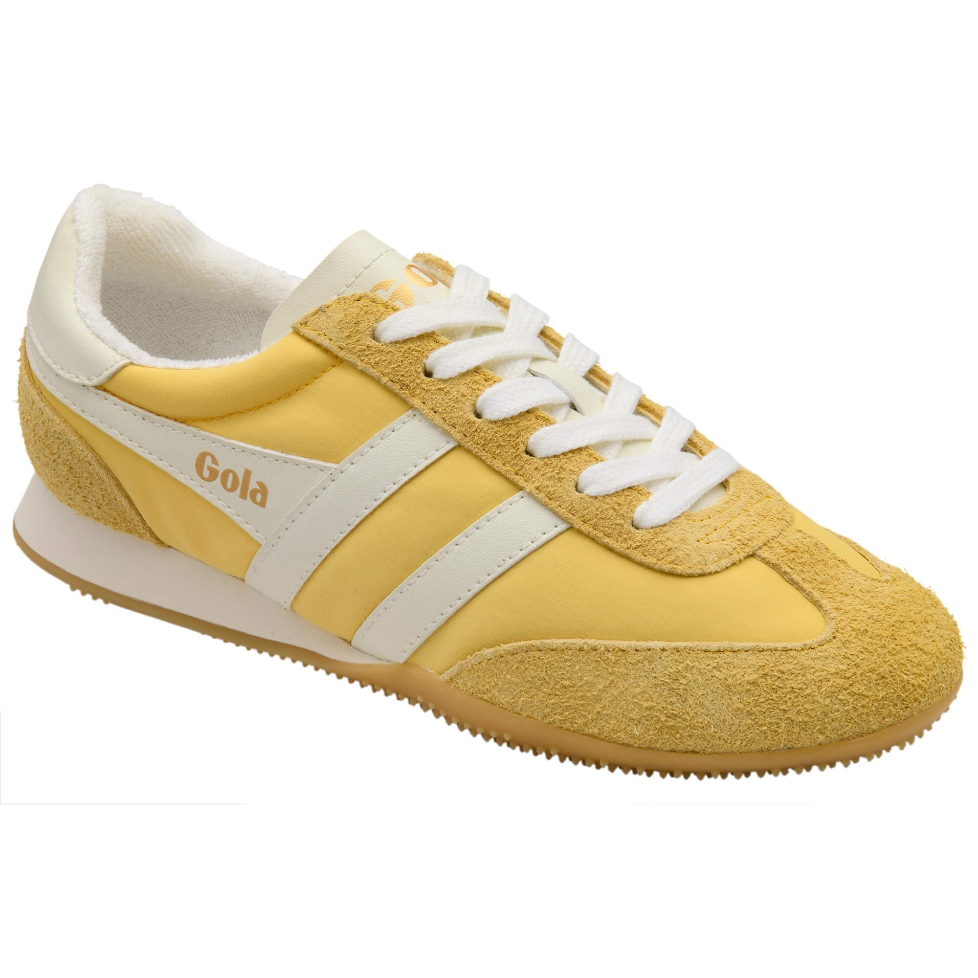 Yellow Gola trainer with white laces on a white background