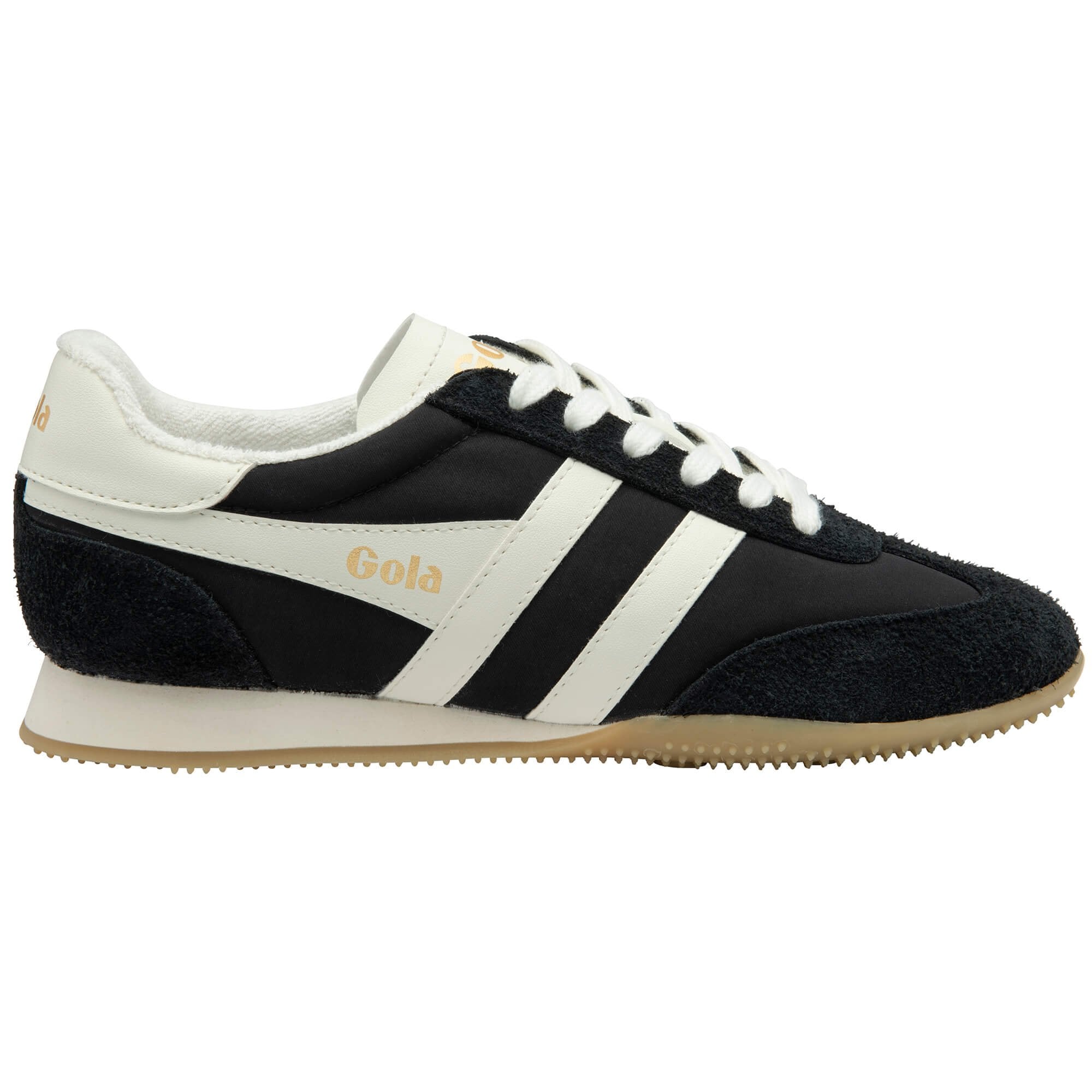 Black and white trainer with 'Gola' branding on a white background