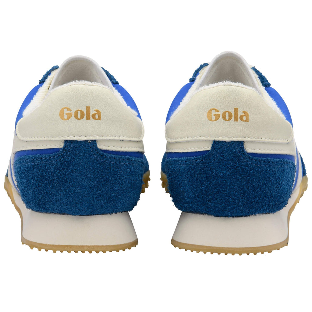 Blue and white Gola trainers on a white background