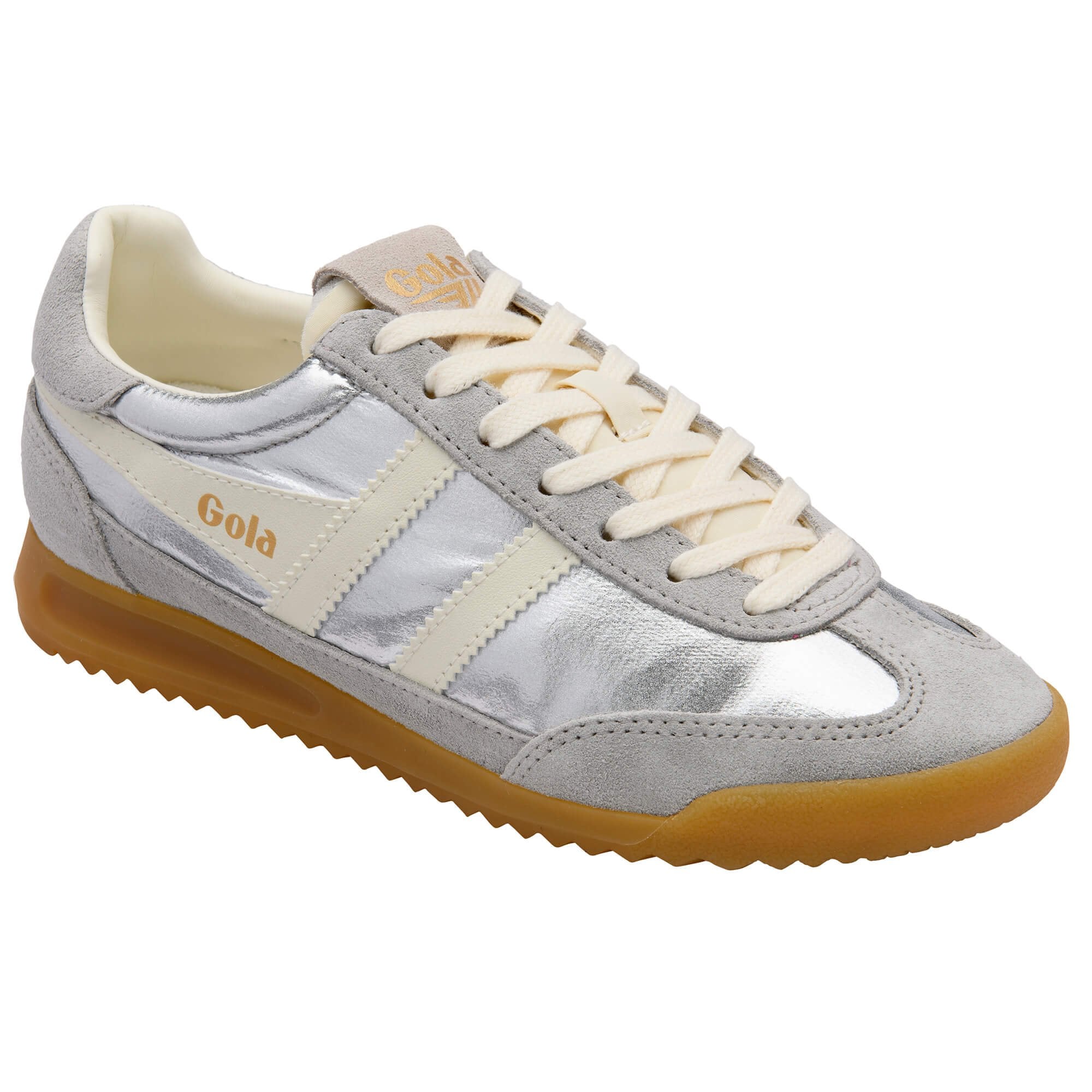 Silver trainer with white laces and brown sole on a white background