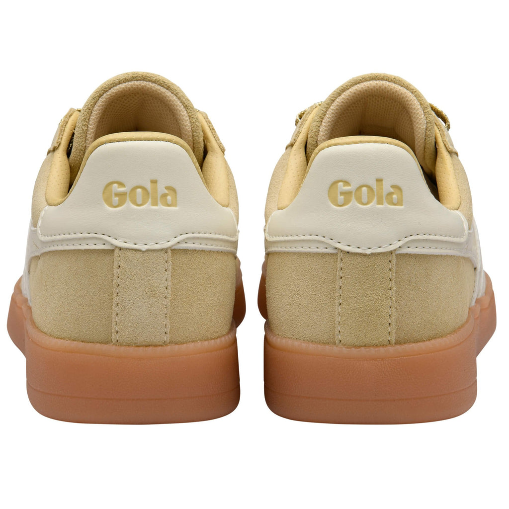 Beige Gola trainers with white soles on a white background