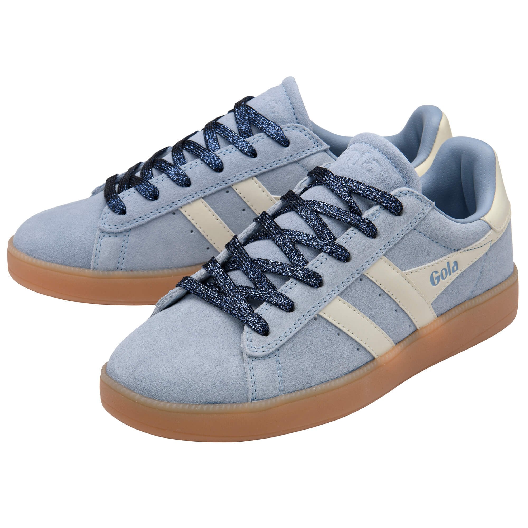 Pair of blue trainers with brown soles on a white background