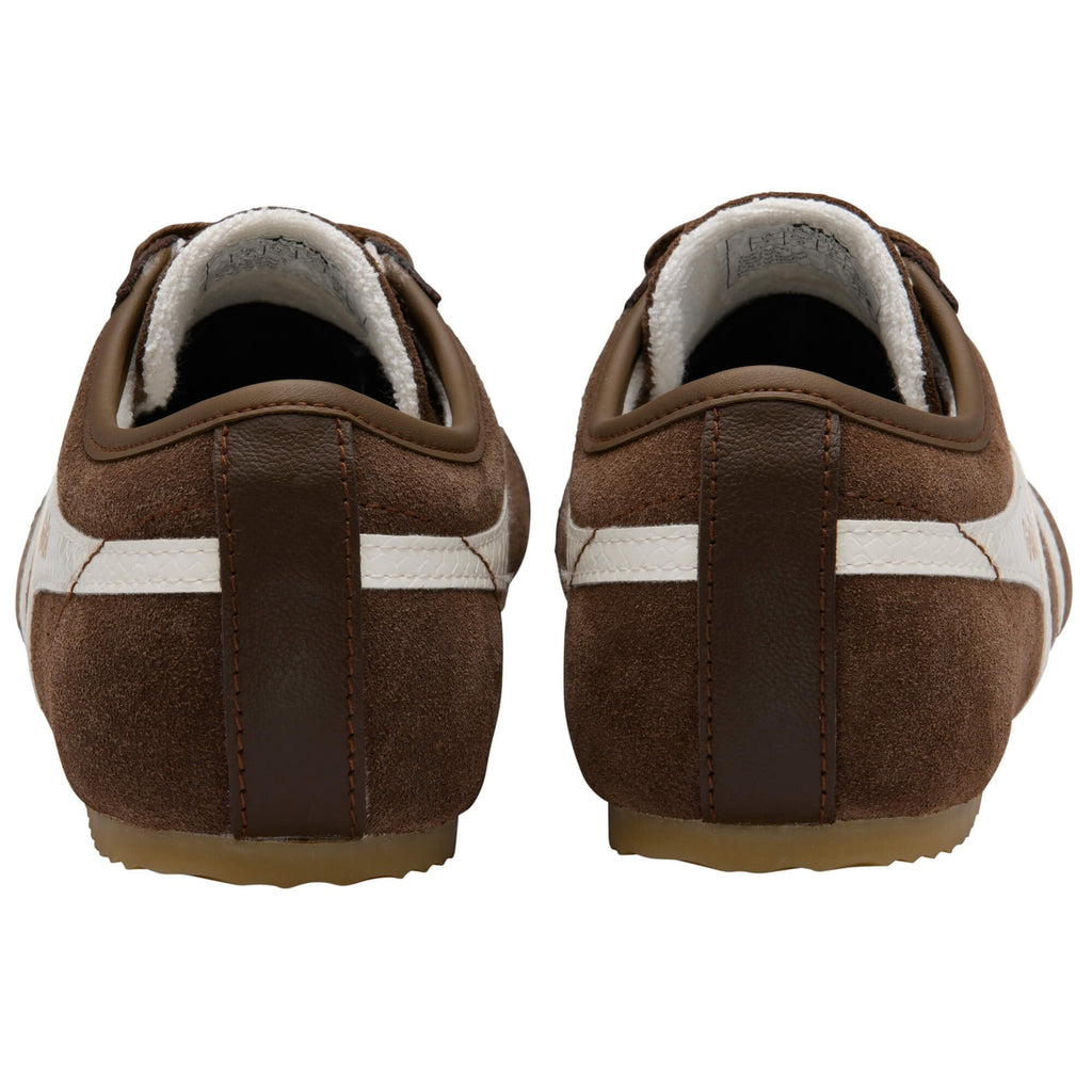 Brown trainers with white stripes on a white background