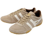 Beige Gola trainers with white stripes and brown lining on a white background