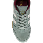 Green Gola trainer with white stripes on a white background