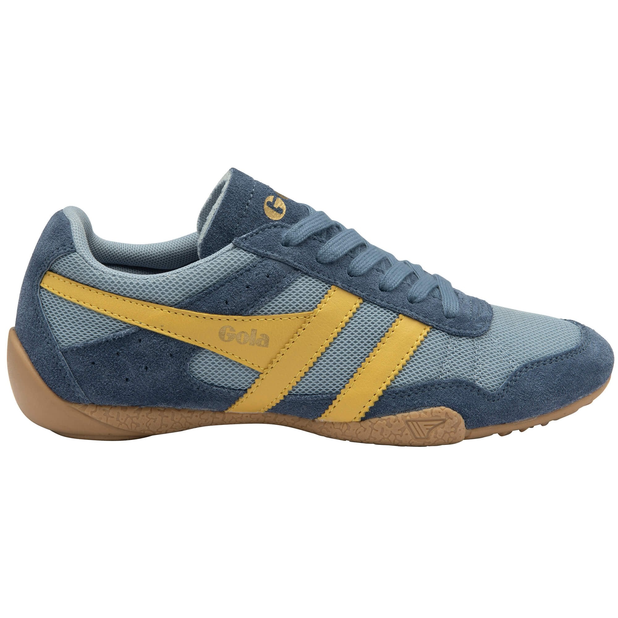 Blue and yellow trainer with brown sole on a white background