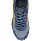 Blue and yellow trainer with 'Gola' branding on a white background