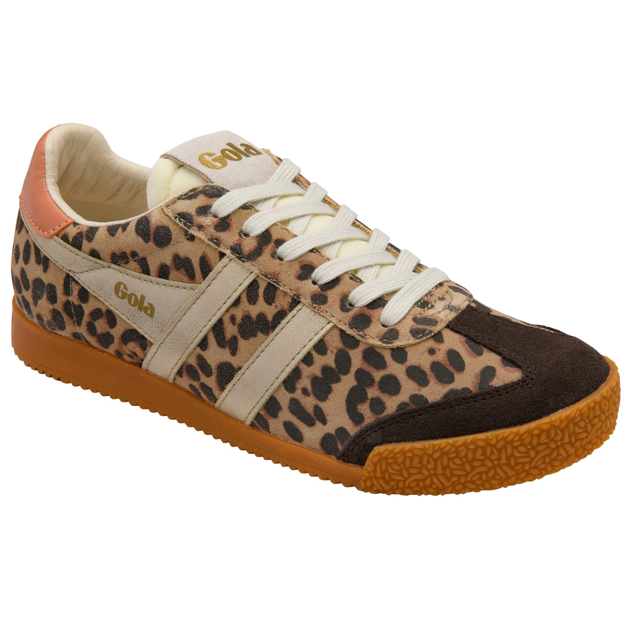 Animal print trainer with brown sole on a white background