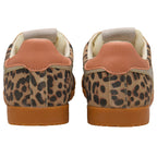 Pair of trainers with animal print pattern on a white background