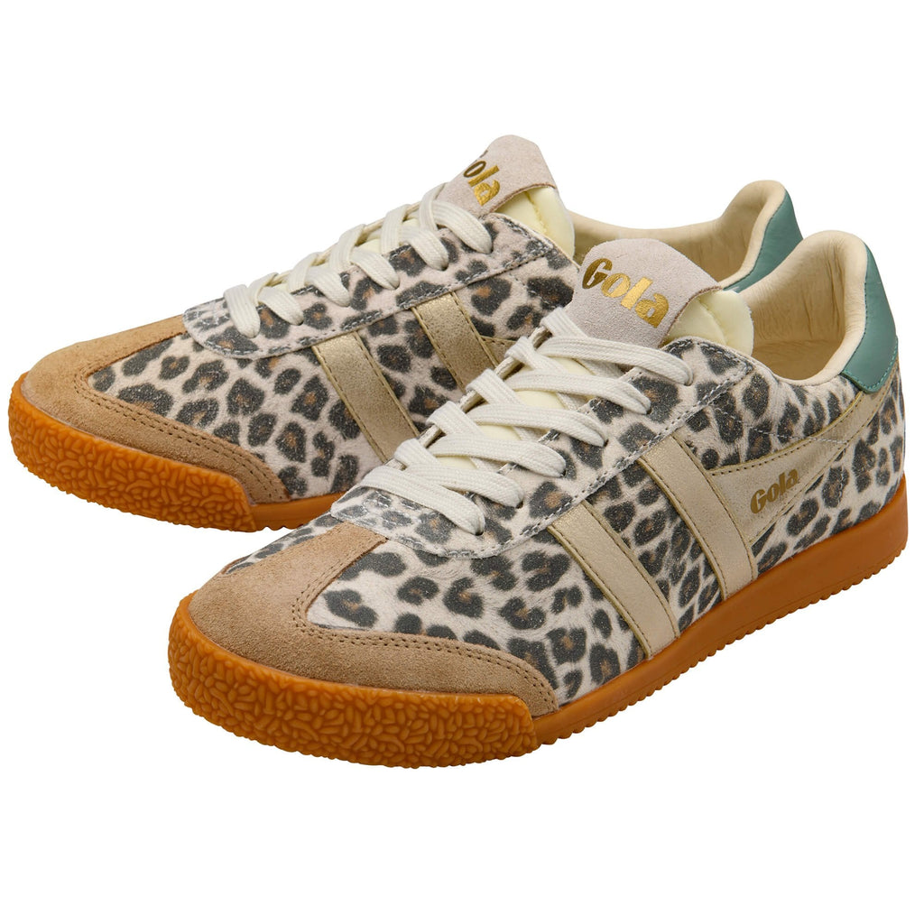Pair of Gola trainers with animal print upper, tan suede accents, gold stripes, and gum soles