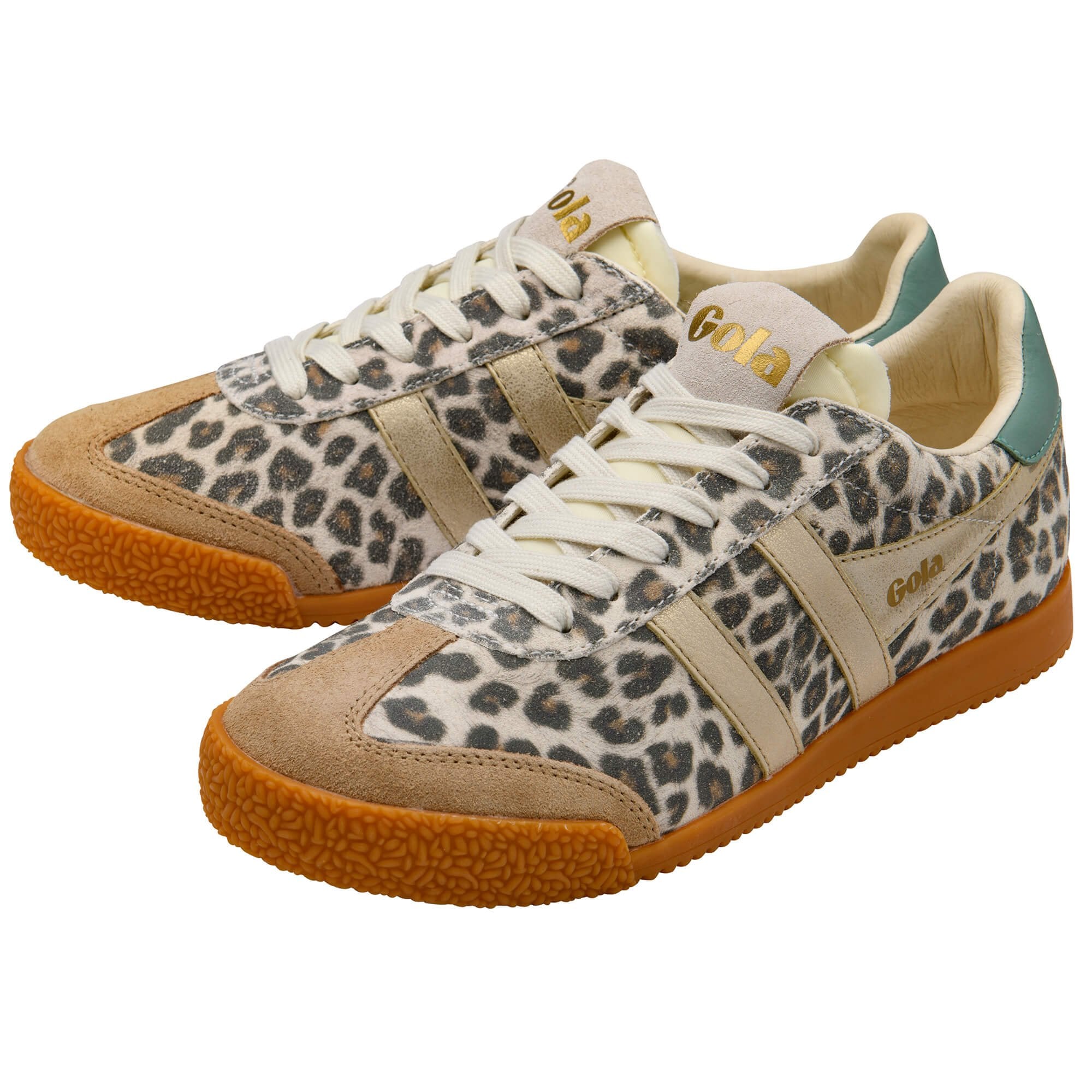 Pair of Gola trainers with animal print upper, tan suede accents, gold stripes, and gum soles