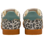 Pair of animal print trainers with a green heel tab on a white background