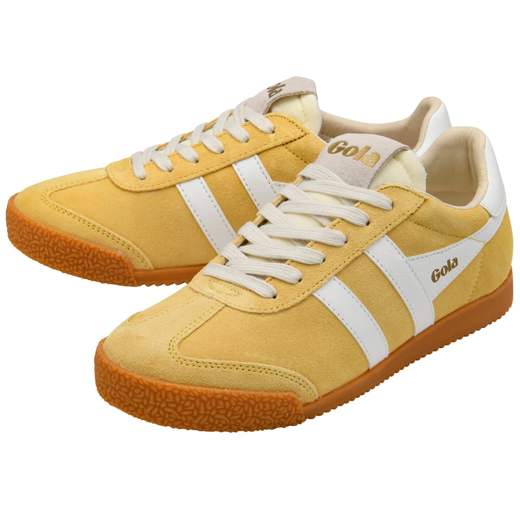 Yellow Gola trainers with white laces and accents on a white background