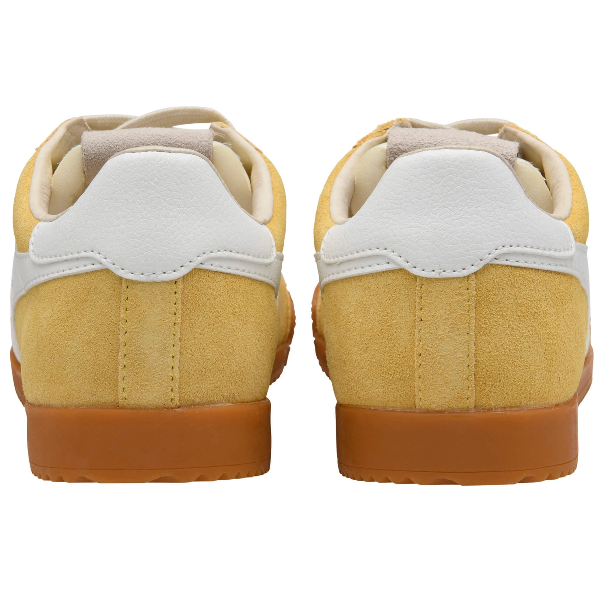Pair of yellow Gola trainers with white accents and gum soles on a white background