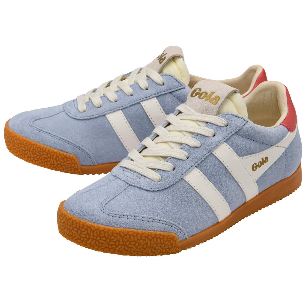 Pair of light blue Gola trainers with white stripes, red accents, white laces and a gum sole on a white background