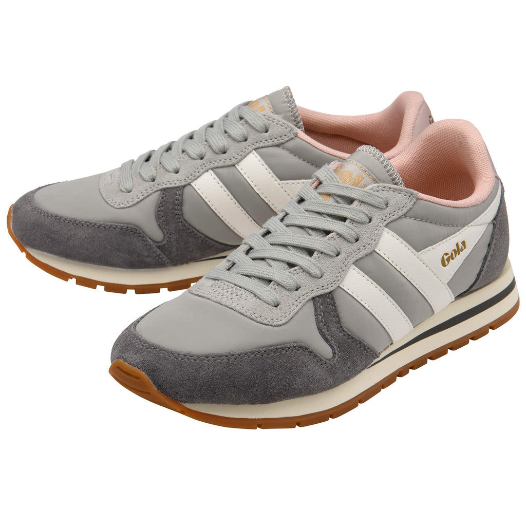 Grey Gola trainers with white stripes, pink lining and brown soles on a white background
