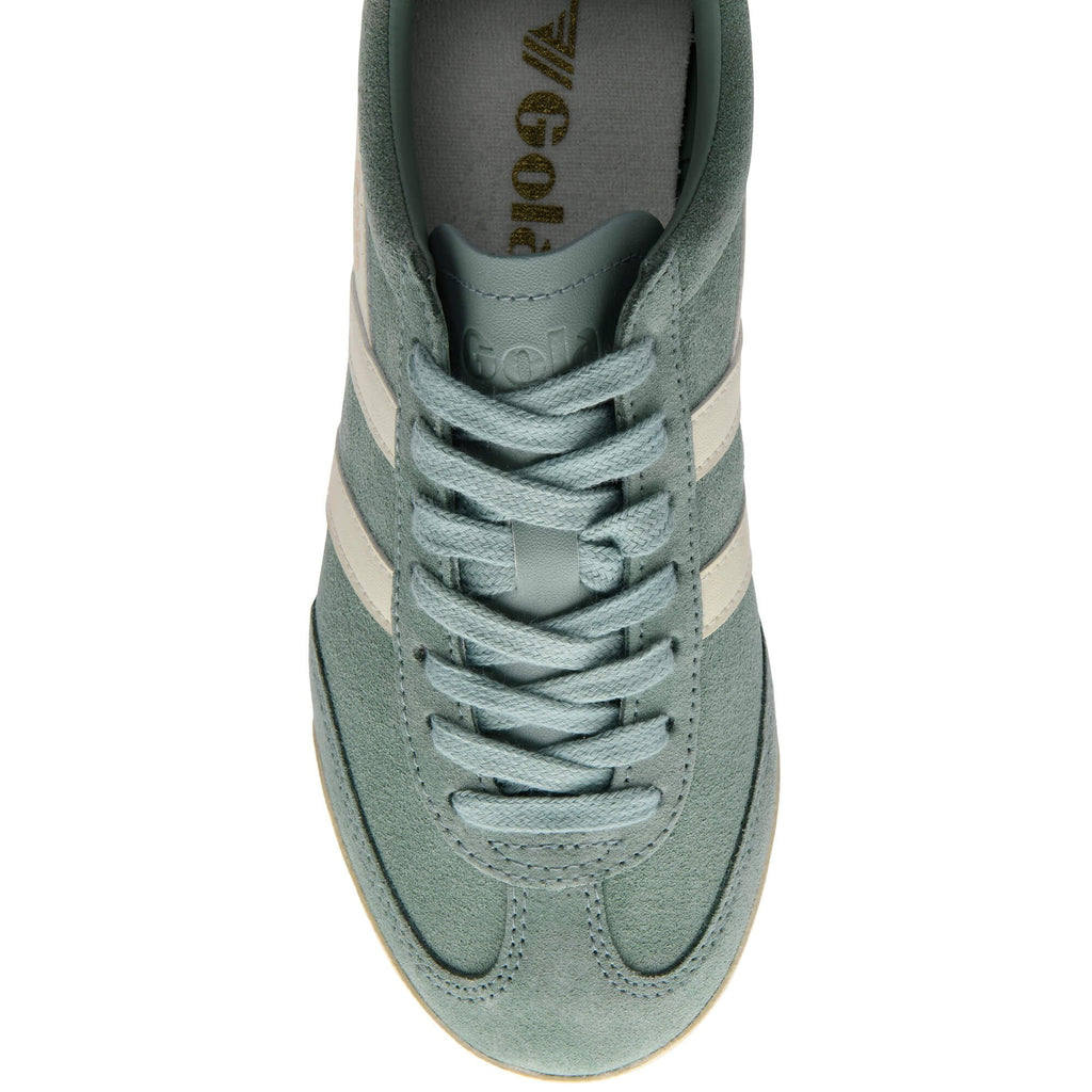 Green Gola trainer with white stripes on a white background