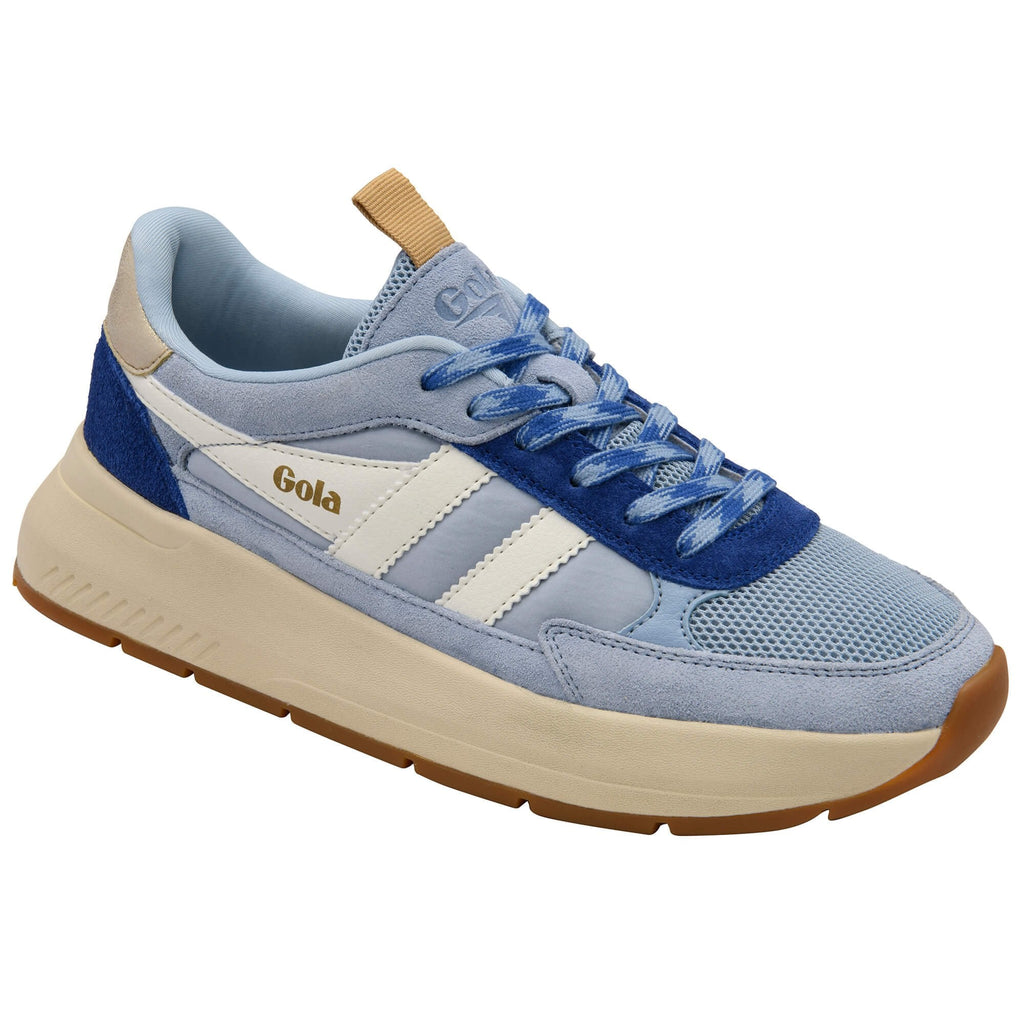 Blue and white trainer with brown sole on a white background