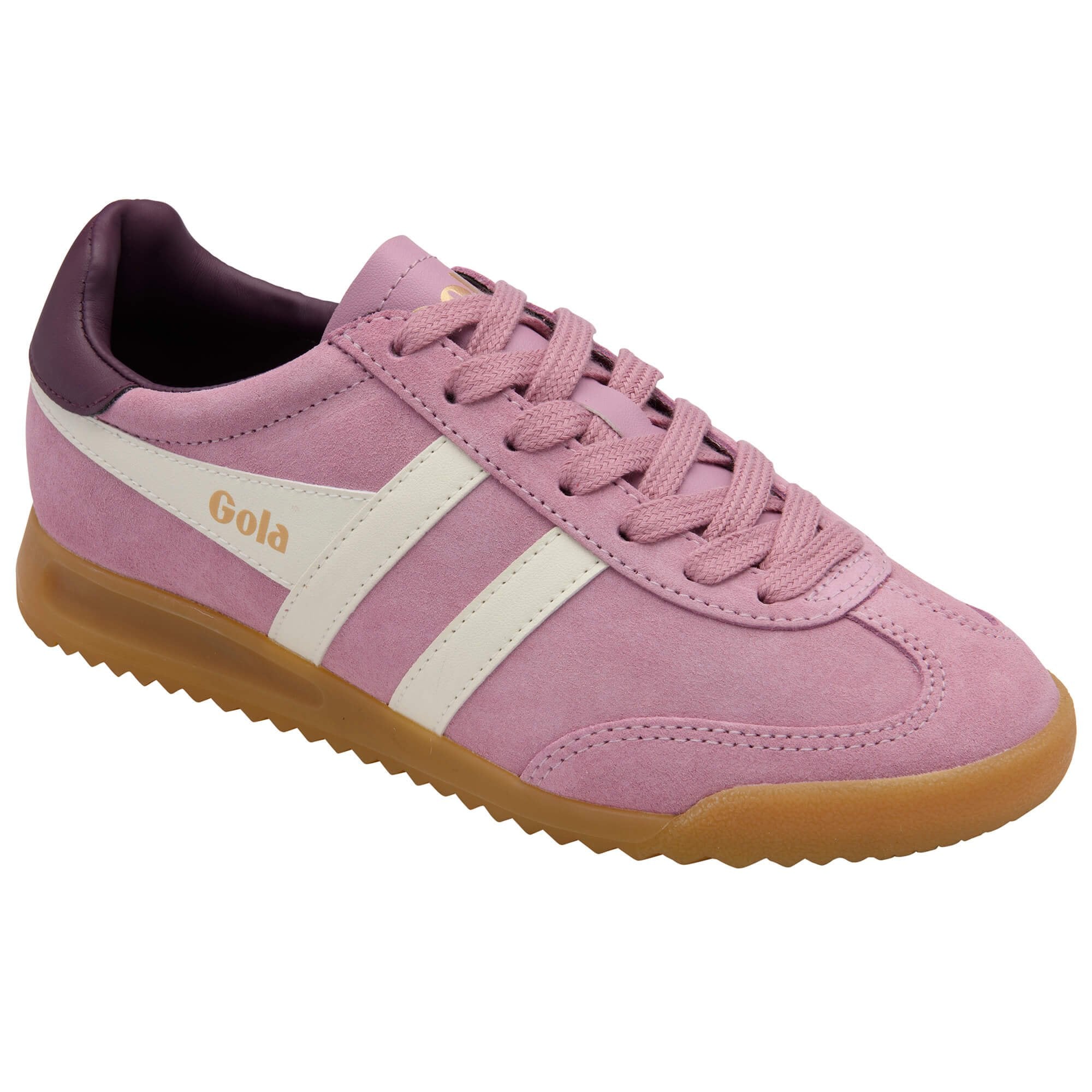 Gola pink and white trainer with a gum sole on a white background