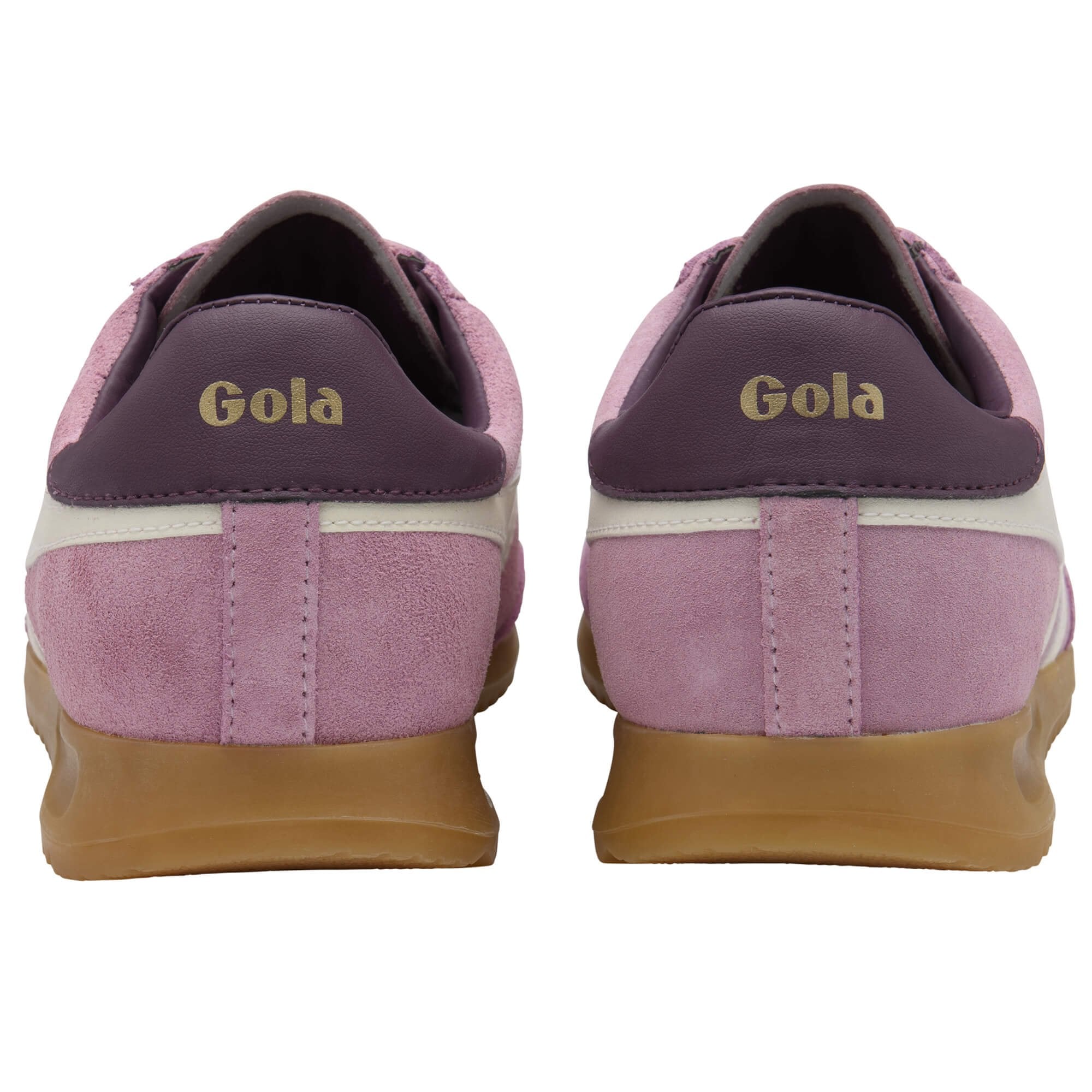 Purple and white Gola trainers with brown soles on a white background