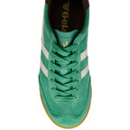Top-down view of a green suede Gola trainer with white stripes and brown trim
