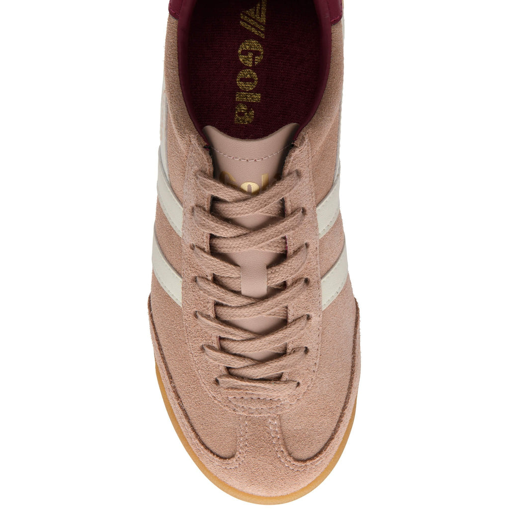 Pink Gola trainer with white stripes on a white background