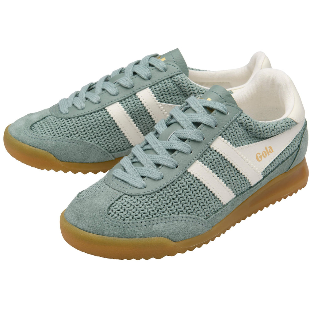 Pair of light blue Gola trainers with white stripes on a white background