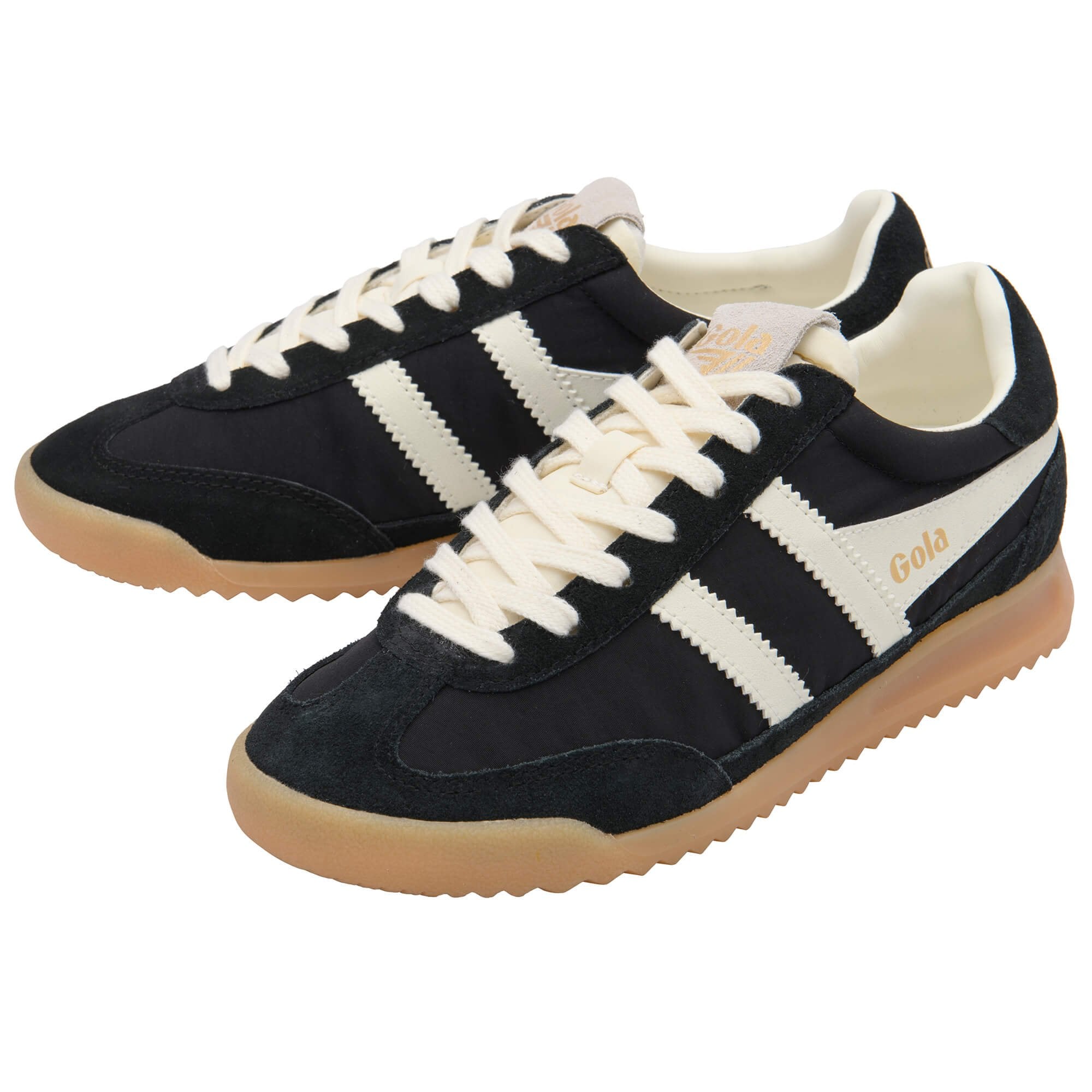 Black Gola trainers with white stripes and gum soles on a white background