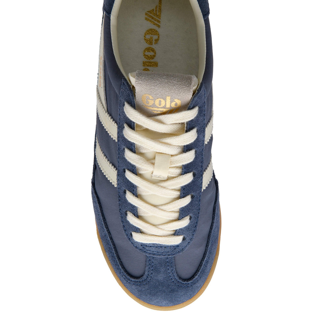 Blue Gola trainer with white laces, white stripes and gum sole on a white background