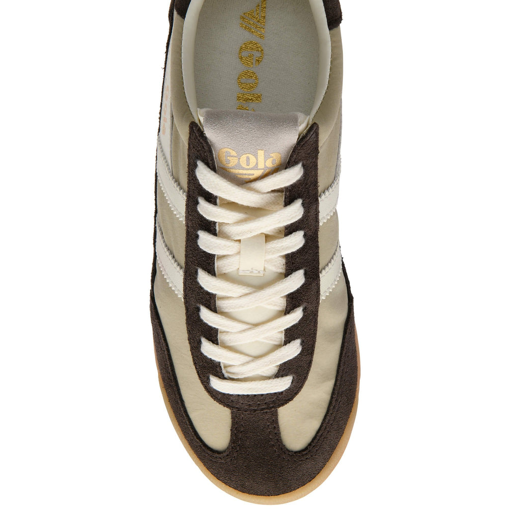 Brown and beige Gola trainer with white laces on a white background