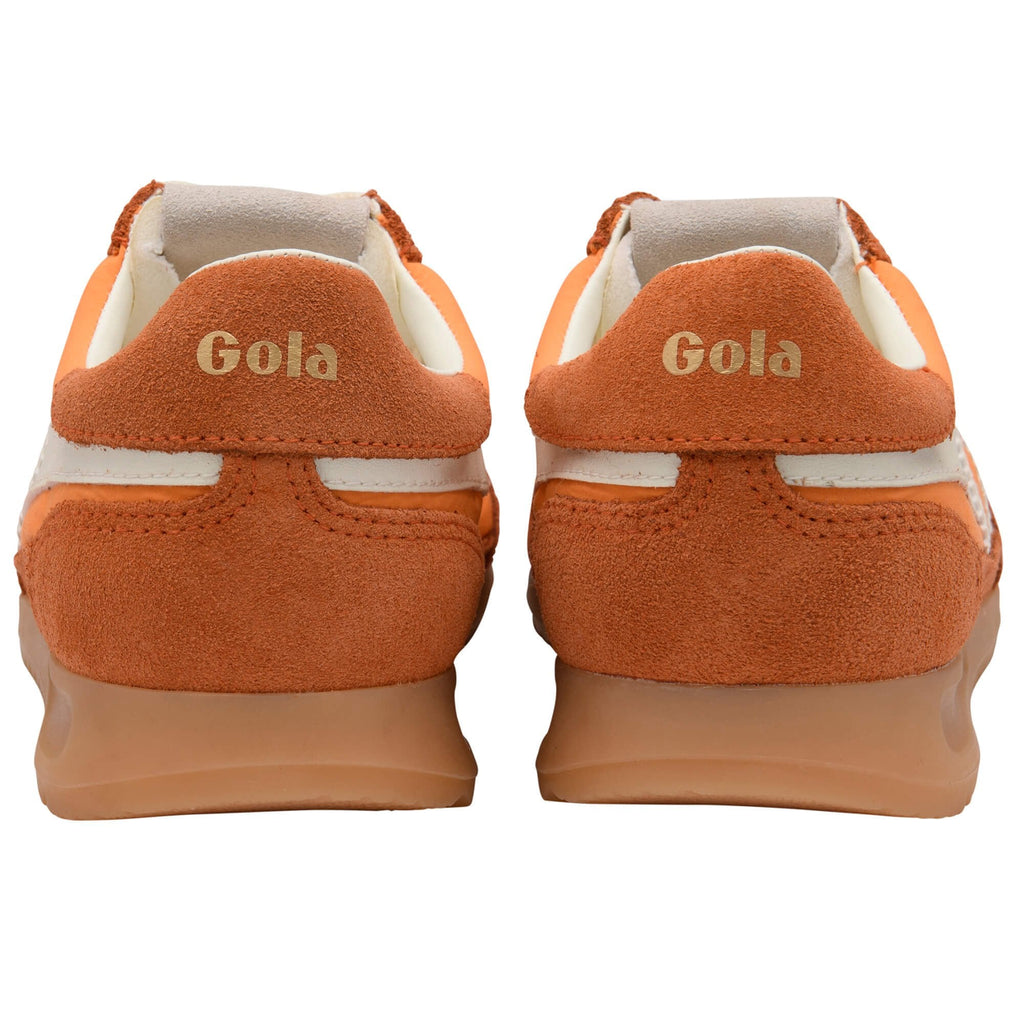 Orange Gola trainers with white accents shown from the back on a white background
