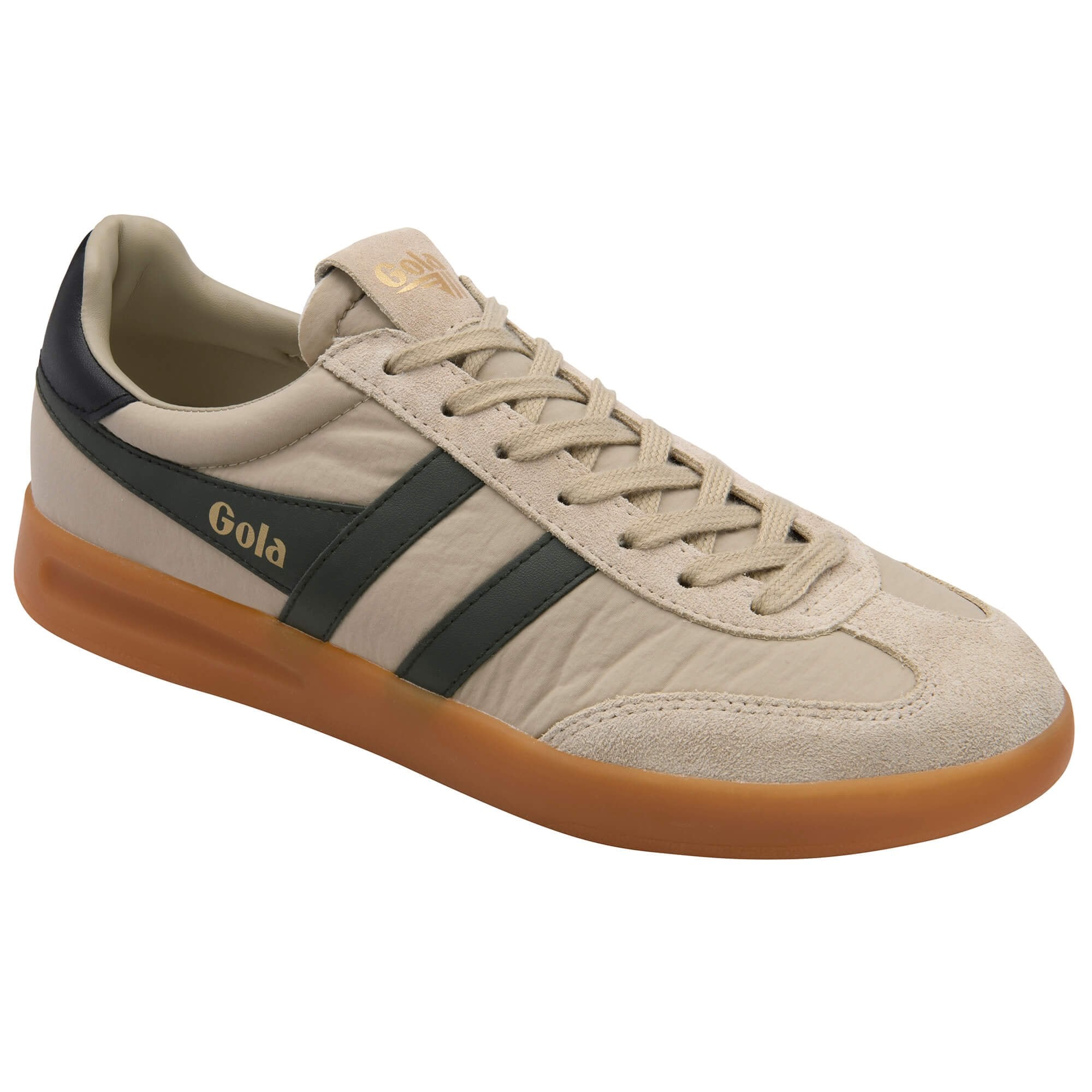 Beige trainer with black stripe and brown sole on a white background