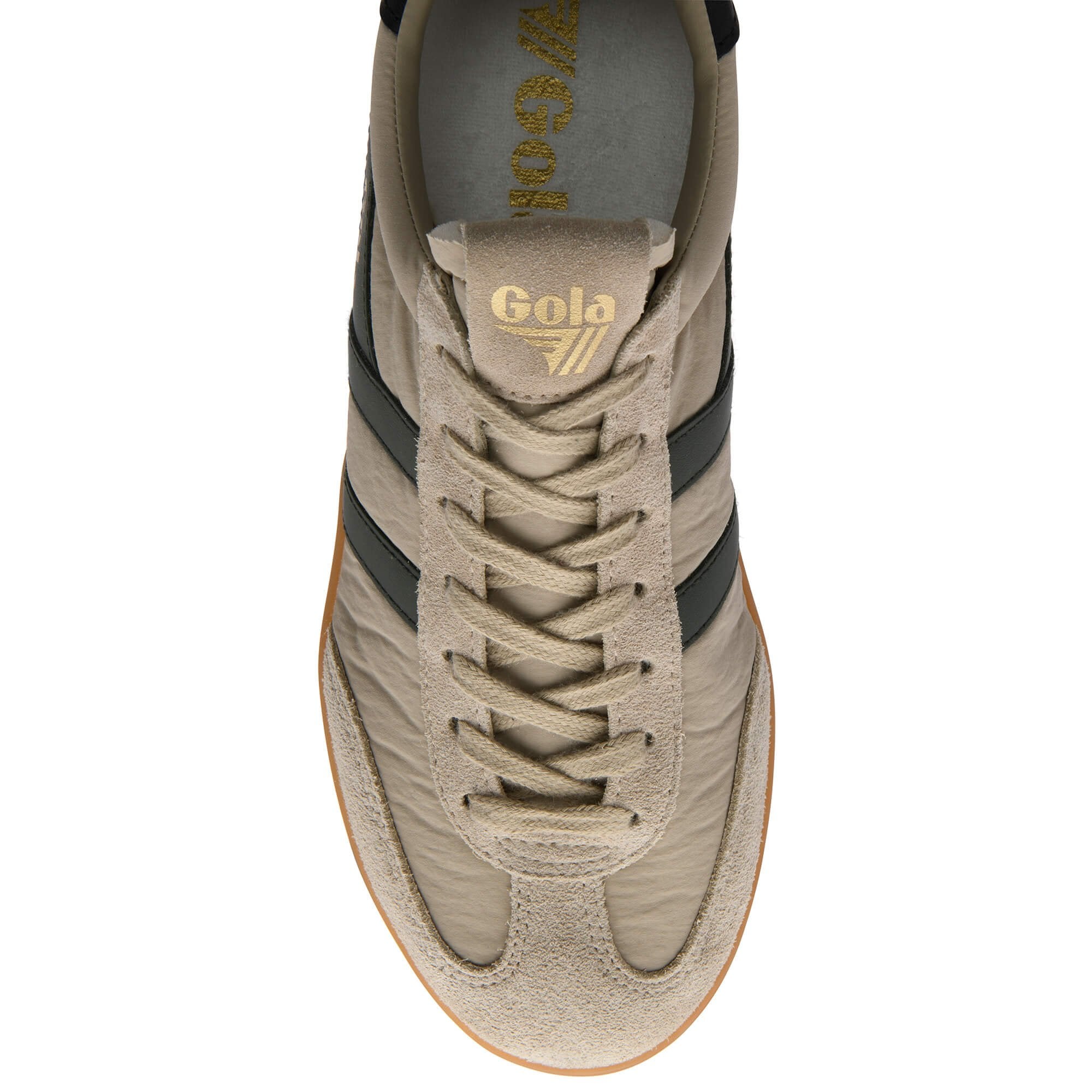 Beige trainer with black stripes and 'Gola' branding on a white background