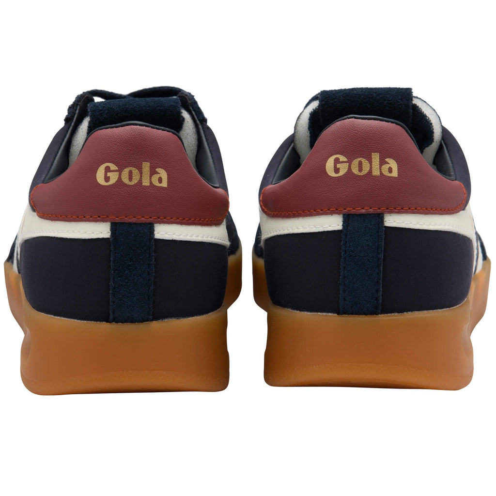 Back view of Gola trainers with brown soles on a white background
