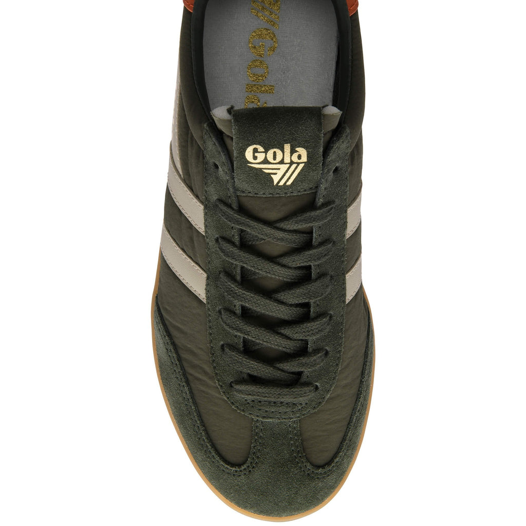 Green Gola trainer with white stripes on a white background