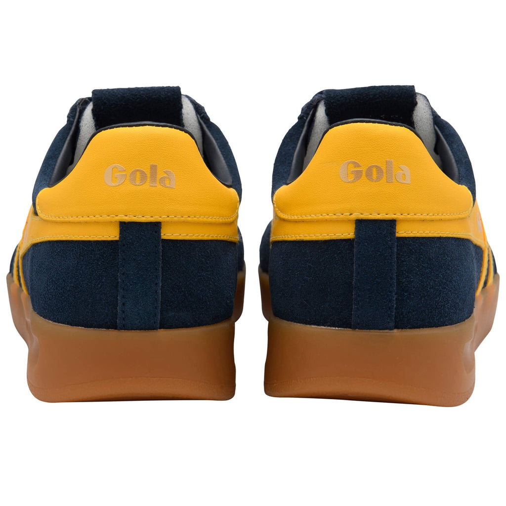 Back view of navy and yellow Gola trainers on a white background