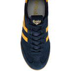 Navy blue trainer with yellow stripes and Gola logo on a white background