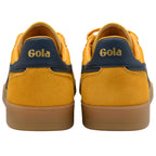 Yellow Gola trainers with brown soles on a white background