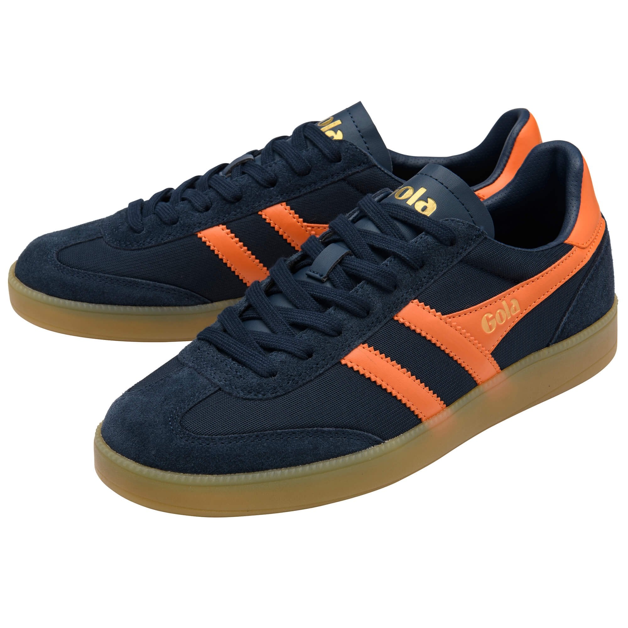 Navy and orange trainers with 'Gola' branding on a white background