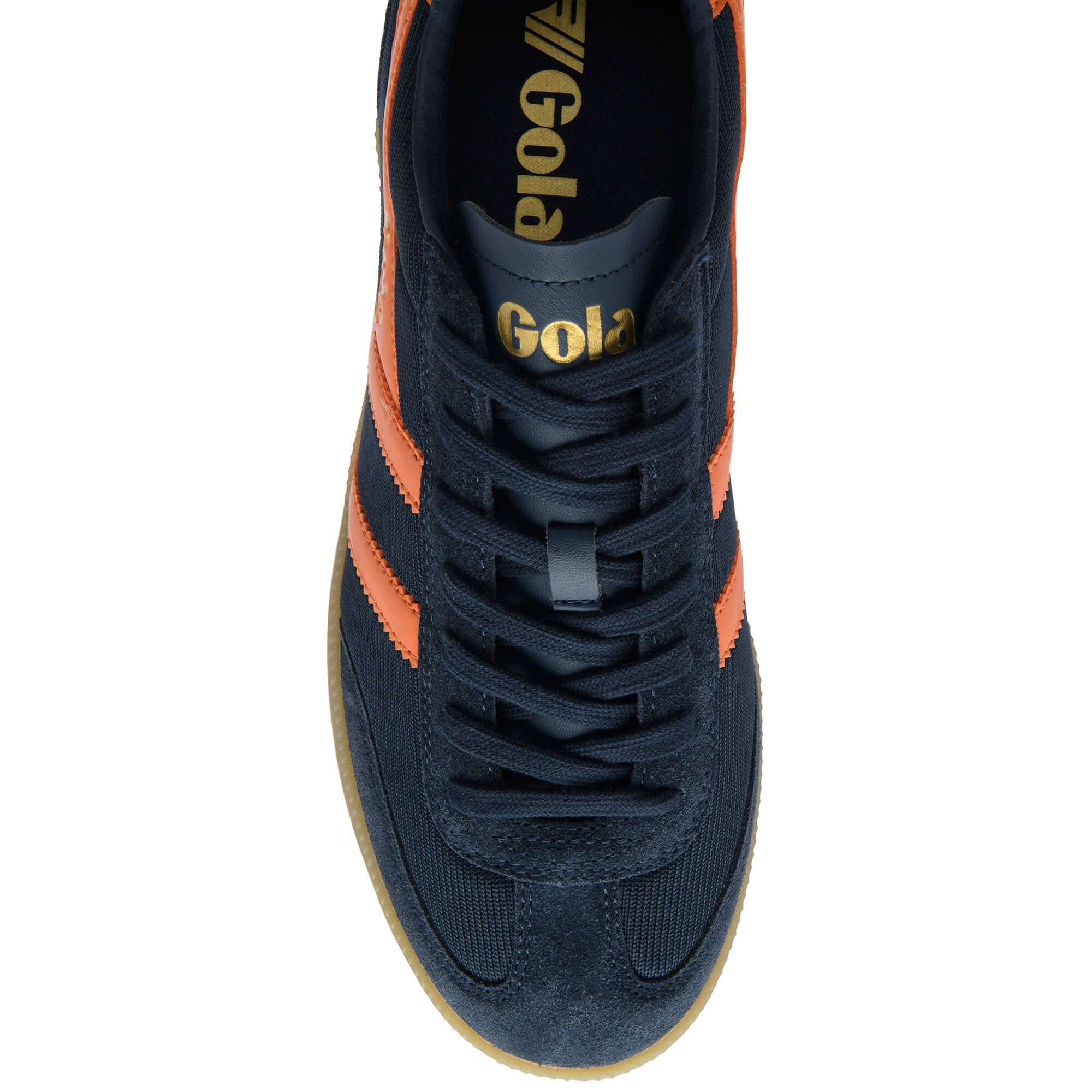 Navy blue trainer with orange accents on a white background