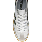 White trainer with green accents and 'Gola' branding on a white background