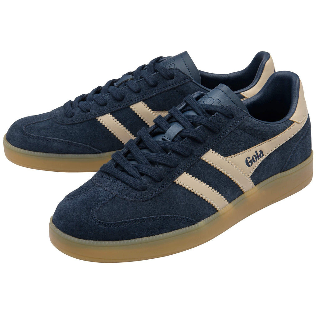 Navy blue trainers with tan soles and Gola logo on a white background
