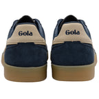 Navy and beige Gola trainers on a white background