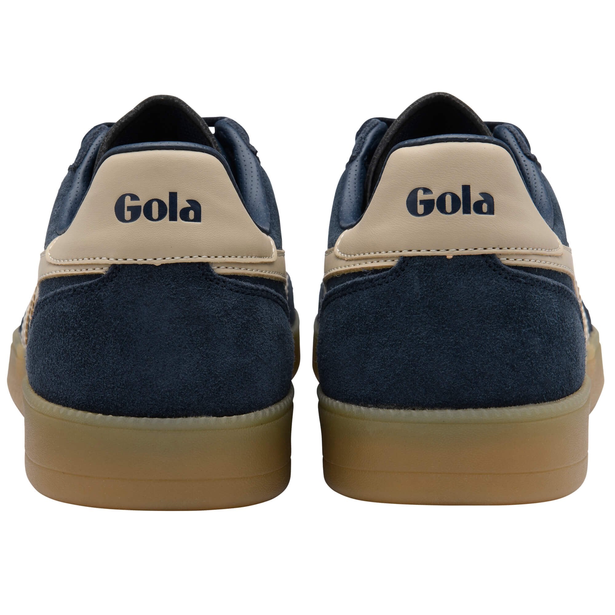 Navy and beige Gola trainers on a white background